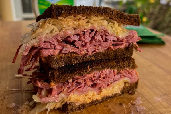 Reuben Sandwich<p class="archive-product-description" ><p>A classic Reuben sandwich featuring corned beef made with Grama Grass & Livestock local beef, served with a side salad</p>
</p>